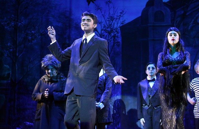 Cast members on stage.