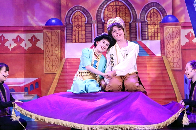 Actors in Aladdin costumes