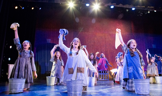 Actors in Annie Jr costumes