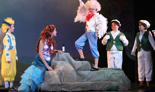 Actors in costumes from The Little Mermaid Jr