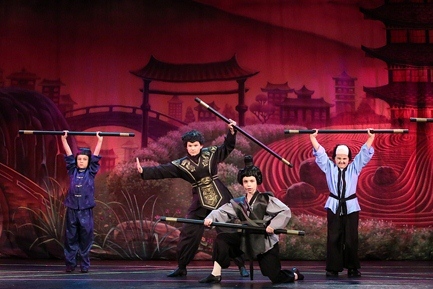 Actors in costumes from Mulan Jr