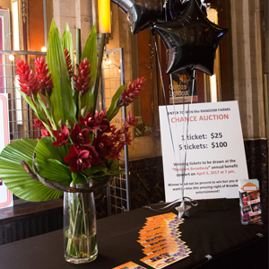 Flowers and an ad advertising the Gala