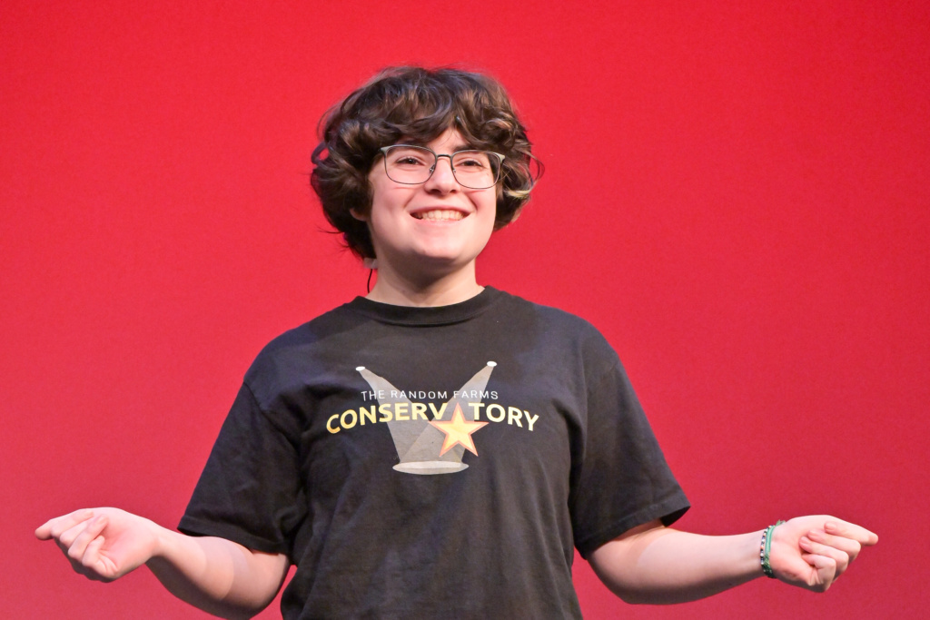 An actor wearing a Conservatory t-shirt.