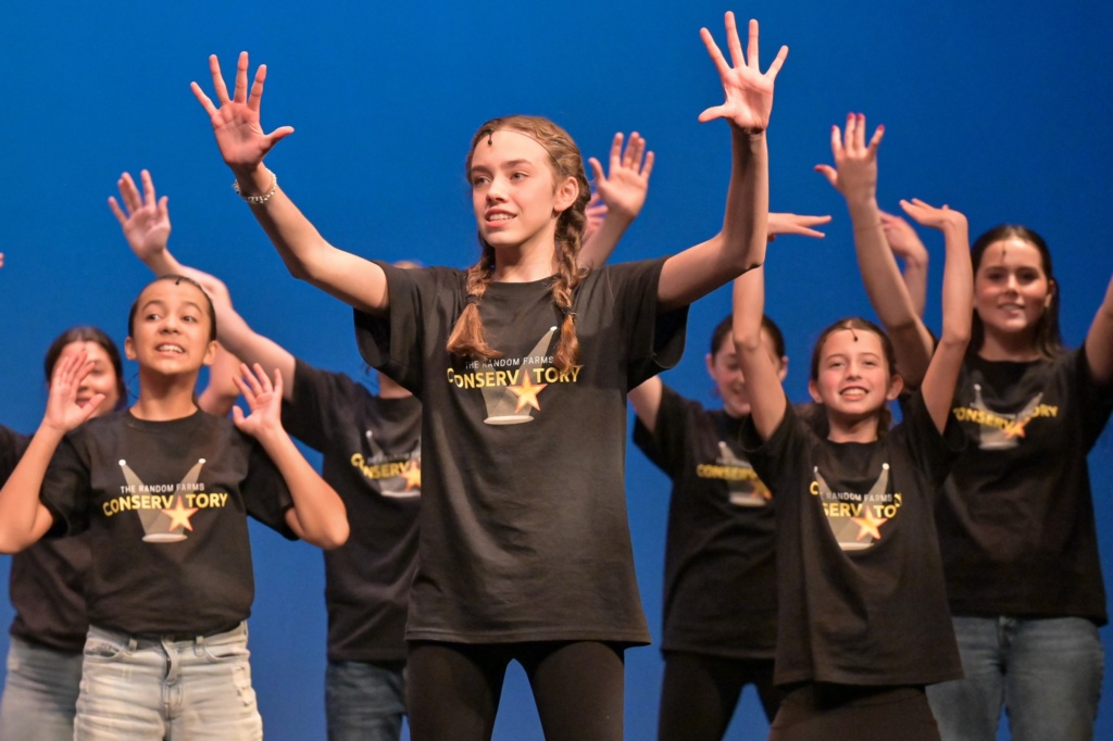 Cast members performing.