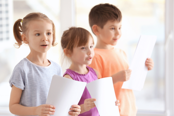 3 children at a voice lesson
