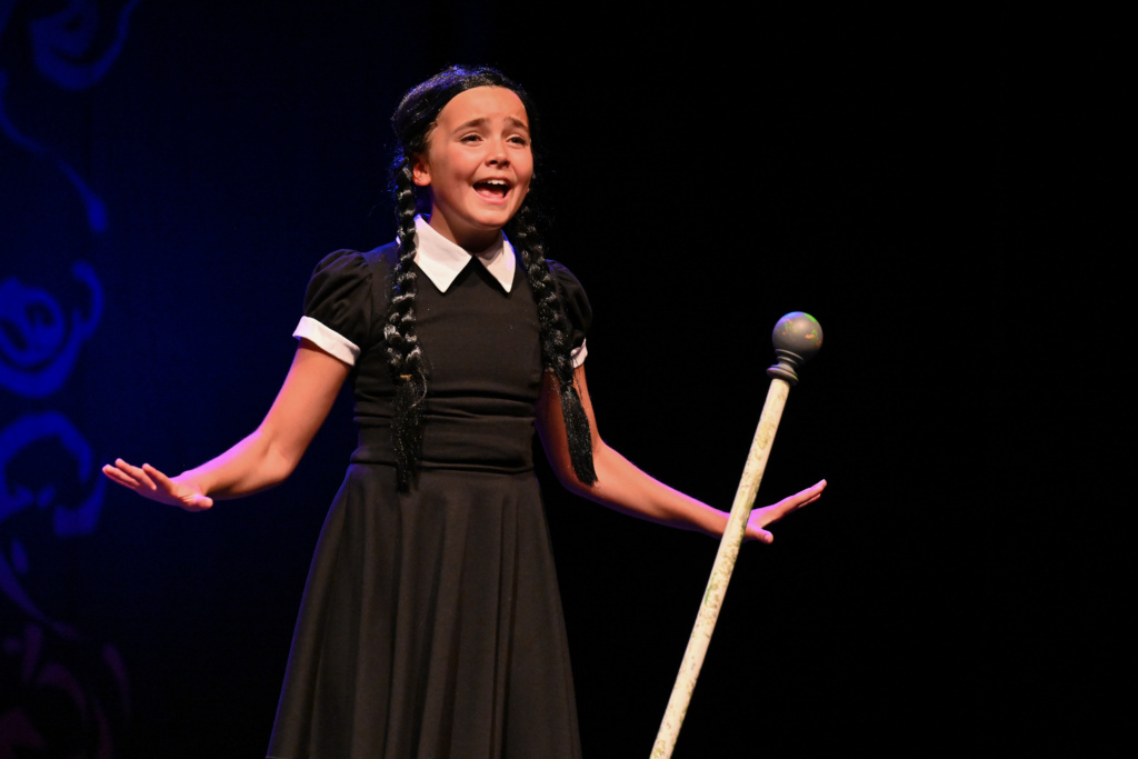 A cast member performing.