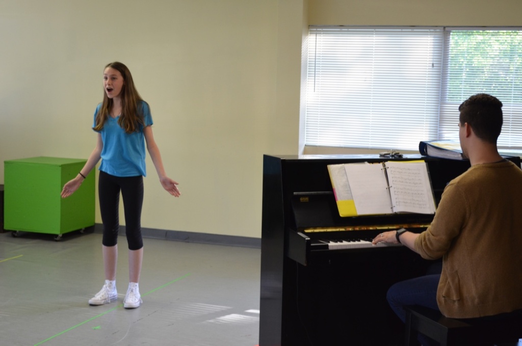 A student receiving a private lesson